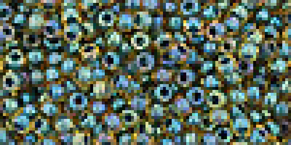 Toho 2,0mm (0243) Inside Color Rainbow Topaz/ Opak Emerald Lined 250g